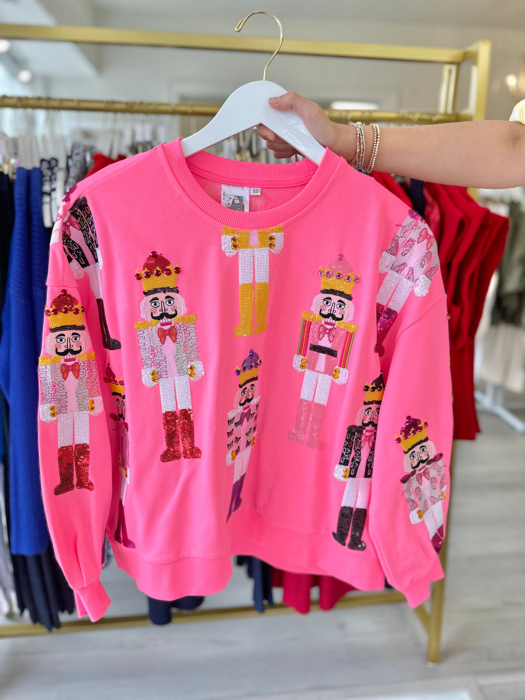 Queen of Sparkles Neon Pink Scatter Nutcracker Sweatshirt