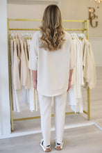 The She's All Set, Beige