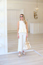 Ivory Stretch Peplum Top